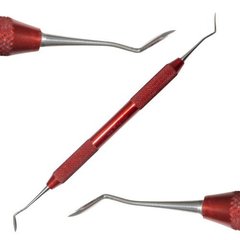 Double-sided fissure finisher with pointed tips and a red handle from the TOMAS modeling kit