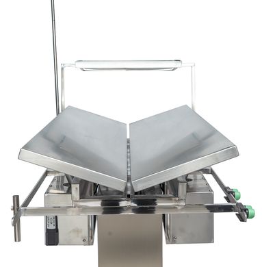 Professional surgical table with V-shaped table top with slopes